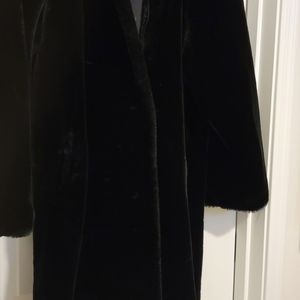 Dennis Basso hooded faux fur with garment bag. Frog closures and it also zips up